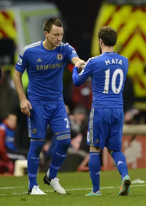 Framed Print : Juan Mata Transfers Chelsea Captain Armband to John Terry During Substitution at Stoke City (January 12, 2013)
