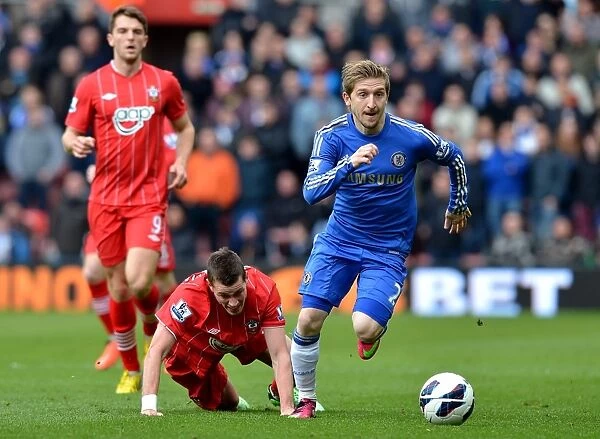 Marko Marin Outmaneuvers Morgan Schneiderlin: A Moment of Skill in the Barclays Premier League Clash Between Chelsea and Southampton