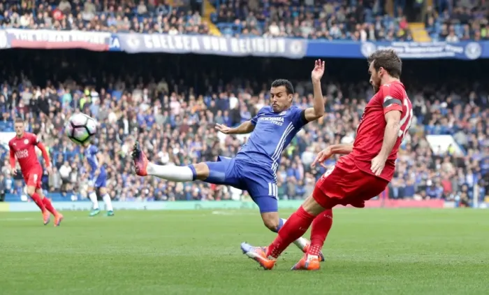 Framed Print : Pedro vs Fuchs: Intense Battle for Ball Possession in Chelsea vs Leicester City Premier League Clash at Stamford Bridge