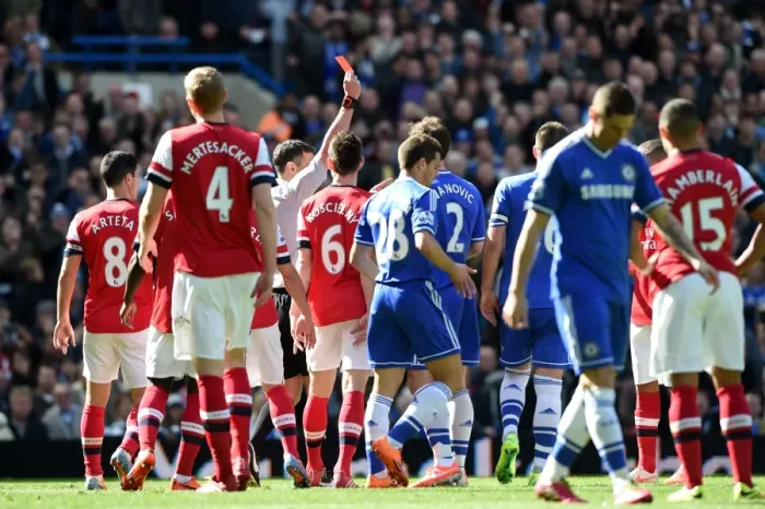 Framed Print : Red Card for Gibbs: Oxlade-Chamberlain Witnesses Chelsea vs. Arsenal Rivalry (22nd March 2014) Framed Print : Red Card for Gibbs: Oxlade-Chamberlain Witnesses Chelsea vs. Arsenal Rivalry (22nd March 2014)