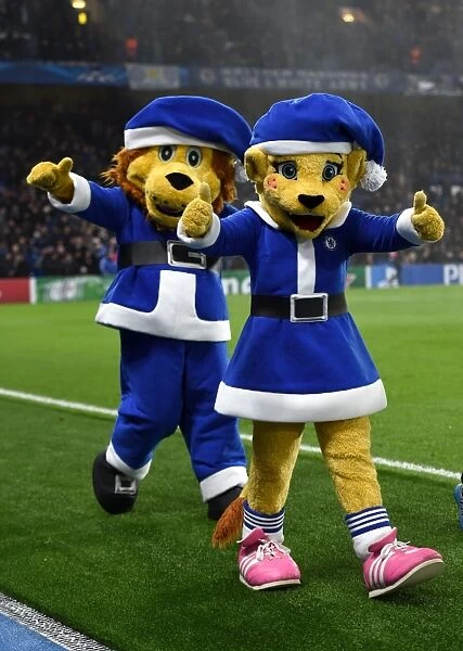 Santa's Lion Pride: Bridgette and Stamford of Chelsea FC Cheer on the Team during UEFA Champions League Match against Sporting Lisbon (December 10, 2014)