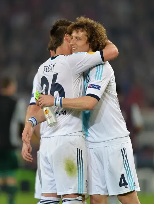 Framed Print : United in Victory: David Luiz and John Terry's Triumphant Moment after Chelsea's Semi-Final Win vs. FC Basel in UEFA Europa League (April 2013)