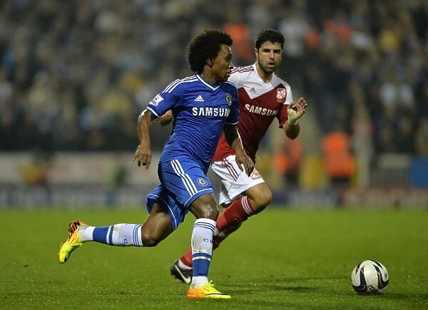 Willian in Action: Chelsea's Star Player Takes On Swindon Town in Capital One Cup Third Round