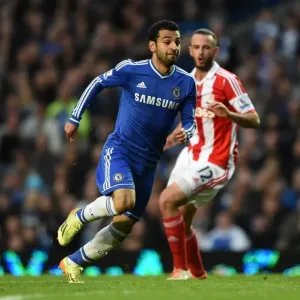 Print of Mohamed Salah and Marc Wilson in action