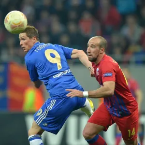 Print of Fernando Torres and Iasmin Latovlevici in mid-air Print of Fernando Torres and Iasmin Latovlevici in mid-air