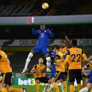 Chelsea's Kurt Zouma Heads the Ball in Empty Molineux Print Chelsea's Kurt Zouma Heads the Ball in Empty Molineux Print