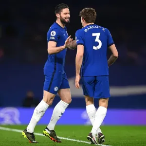 Print of Olivier Giroud and Marcos Alonso celebrating at Stamford Bridge