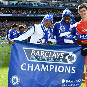 Chelsea's Title Triumph: Loic Remy, Kurt Zouma, and Thibaut Courtois Celebrate Their Premier League Victory