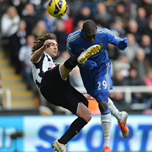 Clash at St. James Park: Demba Ba vs. Coloccini - A Rough Premier League Encounter between Newcastle and Chelsea