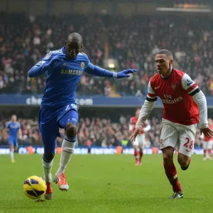 Print of Demba Ba and Kieran Gibbs in Intense Battle for the Ball Print of Demba Ba and Kieran Gibbs in Intense Battle for the Ball