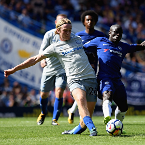 Clash at Stamford Bridge: Kante vs. Davies - Premier League Showdown