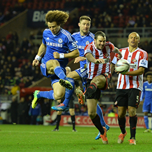 David Luiz and Gary Cahill vs. John O'Shea and Wes Brown: A Battle for the Ball in the Intense Capital One Cup Quarterfinal at Stadium of Light (December 17, 2013)