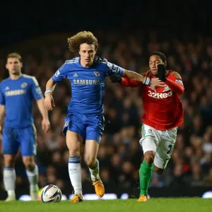 Print of David Luiz vs. Jonathan de Guzman in action