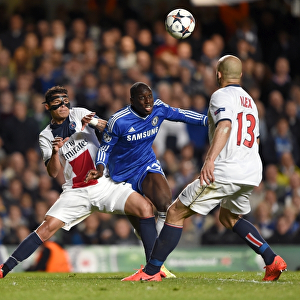 Demba Ba Fights for Ball Against Thiago Silva and Alex in Intense Chelsea vs. Paris Saint-Germain UEFA Champions League Clash (April 8, 2014)