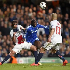Demba Ba Fights for Ball Against Thiago Silva and Alex in Intense Chelsea vs. Paris Saint-Germain UEFA Champions League Clash (April 8, 2014) Demba Ba Fights for Ball Against Thiago Silva and Alex in Intense Chelsea vs. Paris Saint-Germain UEFA Champions League Clash (April 8, 2014)