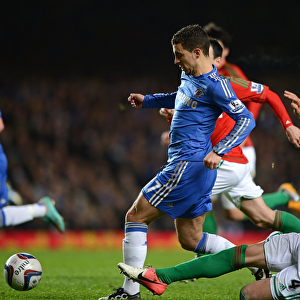 Eden Hazard Dodges Chico's Tackle in Intense League Cup Semi-Final Clash between Chelsea and Swansea (January 9, 2013)