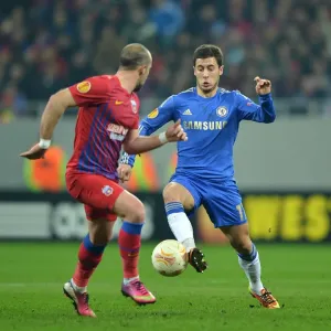 Print of Hazard vs. Latovlevici in Action, Chelsea FC Match Print of Hazard vs. Latovlevici in Action, Chelsea FC Match