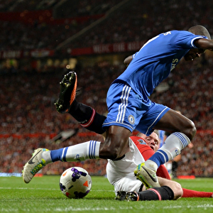 Intense Battle for Ball Possession: Ramires vs. Rooney - Manchester United vs. Chelsea, Barclays Premier League (Old Trafford, August 26, 2013)