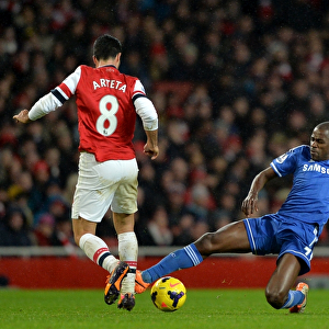 Intense Battle for the Ball: Ramires vs. Arteta - Arsenal vs. Chelsea Rivalry, Barclays Premier League, Emirates Stadium (December 23, 2013)