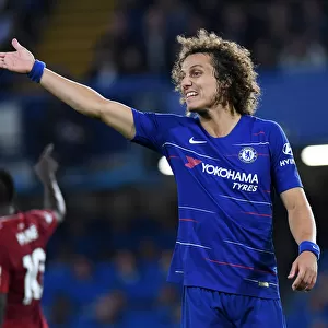 Intense Moment: David Luiz's Expressive Gesture Amidst the Heat of Chelsea vs. Liverpool Clash in Premier League