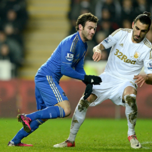 Intense Rivalry: Juan Mata vs. Chico - Battle for Ball in Chelsea vs. Swansea Capital One Cup Semi-Final