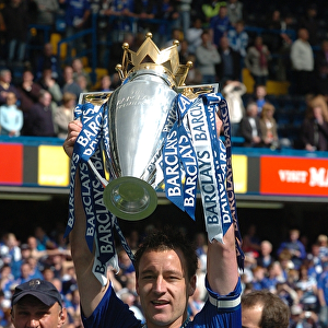 John Terry Lifts the Premier League Trophy: Chelsea's Triumph over Manchester United at Stamford Bridge (2005-2006)