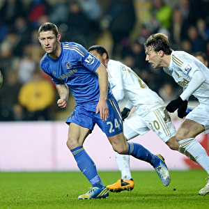 Miguel Michu and Jonathan de Guzman vs. Gary Cahill: A Tactical Battle in the Swansea City vs. Chelsea Capital One Cup Semi-Final