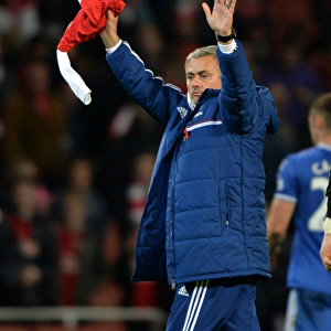 Mourinho's Triumphant Salute: Honoring Ozil after Chelsea's Capital One Cup Victory at Arsenal's Emirates Stadium (29th October 2013)