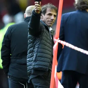 Print of Gianfranco Zola acknowledging Chelsea fans at Anfield