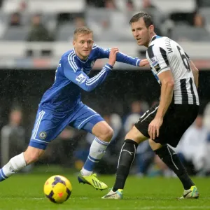 Print of Andre Schurrle and Mike Williamson in action