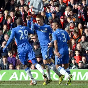 Print of Fernando Torres celebrating a goal at Griffin Park Print of Fernando Torres celebrating a goal at Griffin Park