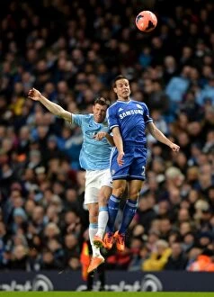 Images Dated 15th February 2014: Azpilicueta vs Milner: Aerial Battle in FA Cup Fifth Round Clash between Chelsea