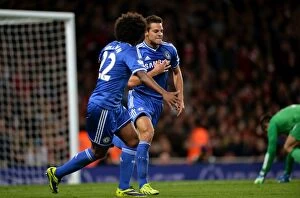 Arsenal v Chelsea 29th October 2013 Collection: Azpilicueta and Willian: Celebrating Chelsea's First Goal in Arsenal Rivalry at Emirates Stadium