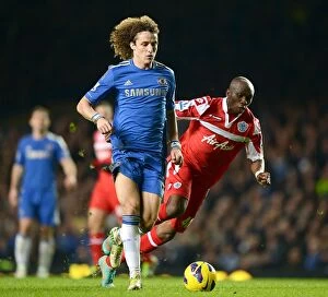 Images Dated 2nd January 2013: Battle for the Ball: David Luiz vs. Stephane Mbia - Chelsea vs