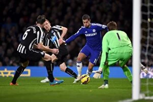 Images Dated 10th January 2015: Battle for the Ball: Eden Hazard vs. Michael Williamson - Chelsea vs