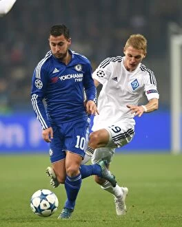 Images Dated 20th October 2015: Battle for the Ball: Eden Hazard vs Vitaliy Buyalsky in Chelsea's UEFA Champions League Showdown