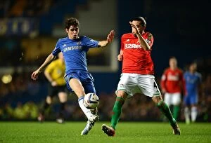 Images Dated 9th January 2013: A Battle for the Ball: Oscar vs Chico - Chelsea vs Swansea City, Capital One Cup Semi-Final