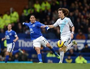 Images Dated 30th December 2012: Battle for the Ball: Pienaar vs. Luiz - Everton vs. Chelsea Rivalry