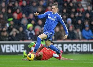 Images Dated 1st January 2014: Battle for the Ball: Torres vs. Lovren - A Premier League Clash (1st January 2014)