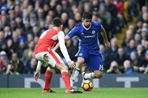 Images Dated 4th February 2017: Battle at Stamford Bridge: Diego Costa vs. Laurent Koscielny - Intense Rivalry between Chelsea