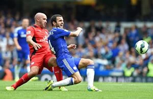 Chelsea v Leicester City 23rd August 2014 Collection: Battle at Stamford Bridge: Fabregas vs. Taylor-Fletcher - Premier League Showdown (August 23, 2014)