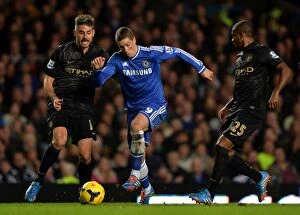 Chelsea v Manchester City 27th October 2013 Collection: Battle at Stamford Bridge: Fernando Torres vs. Fernandinho and Javi Garcia - Chelsea vs