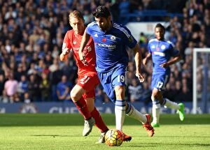 Images Dated 31st October 2015: Battle for Supremacy: Costa vs. Lucas - Intense Rivalry: Chelsea vs. Liverpool's Clash of Titans