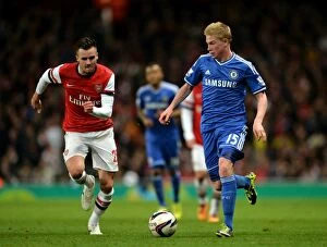 Arsenal v Chelsea 29th October 2013 Collection: De Bruyne Surges Past Jenkinson: Chelsea's Thrilling Charge at Arsenal's Emirates Stadium