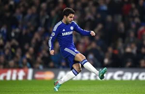 Images Dated 10th December 2014: Cesc Fabregas Scores First Goal for Chelsea in UEFA Champions League Clash Against Sporting Lisbon