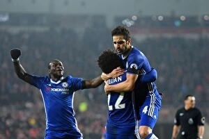 Images Dated 14th December 2016: Cesc Fabregas's Triumphant First Goal for Chelsea: Celebrating with Willian