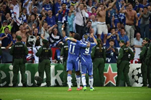 Images Dated 19th May 2012: Champions League Final Showdown: Didier Drogba and Fernando Torres of Chelsea Facing Off Against