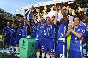 Images Dated 21st May 2017: Chelsea Champions: Gary Cahill and John Terry Lift the Premier League Trophy