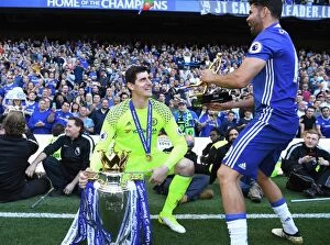 Images Dated 21st May 2017: Chelsea Champions: Thibaut Courtois and Diego Costa Lift the Premier League Trophy