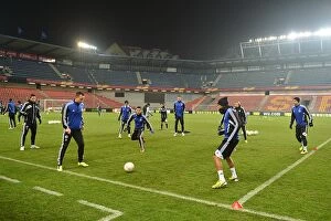 Training Pictures Collection: Chelsea FC: Europa League Training at Generali Arena - Ready for Round of 16 First Leg
